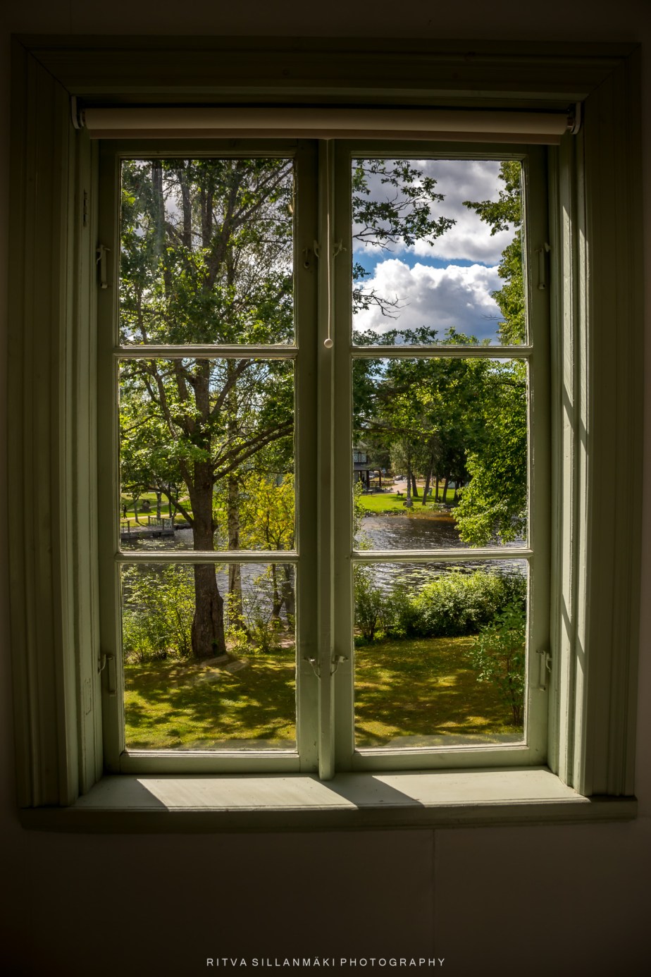 A Glimpse of Vibrant Summer Through Old&nbsp;Windows