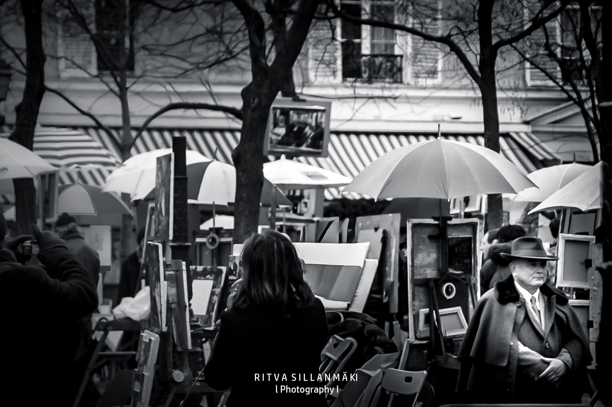 Open-Air Art Market on a Rainy Day